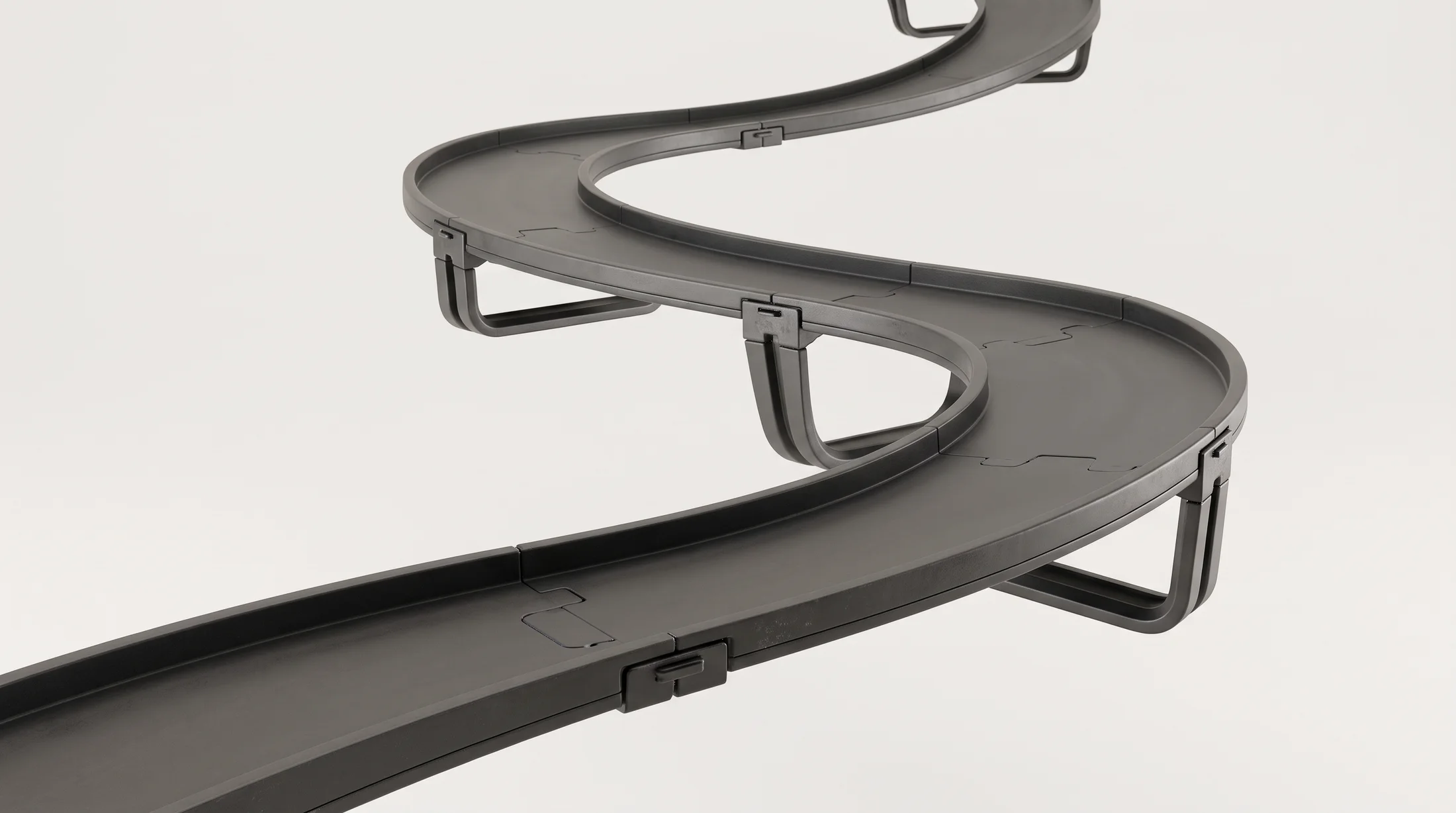 Sistema modular de pista Vitrack em curva, friso de luz azul